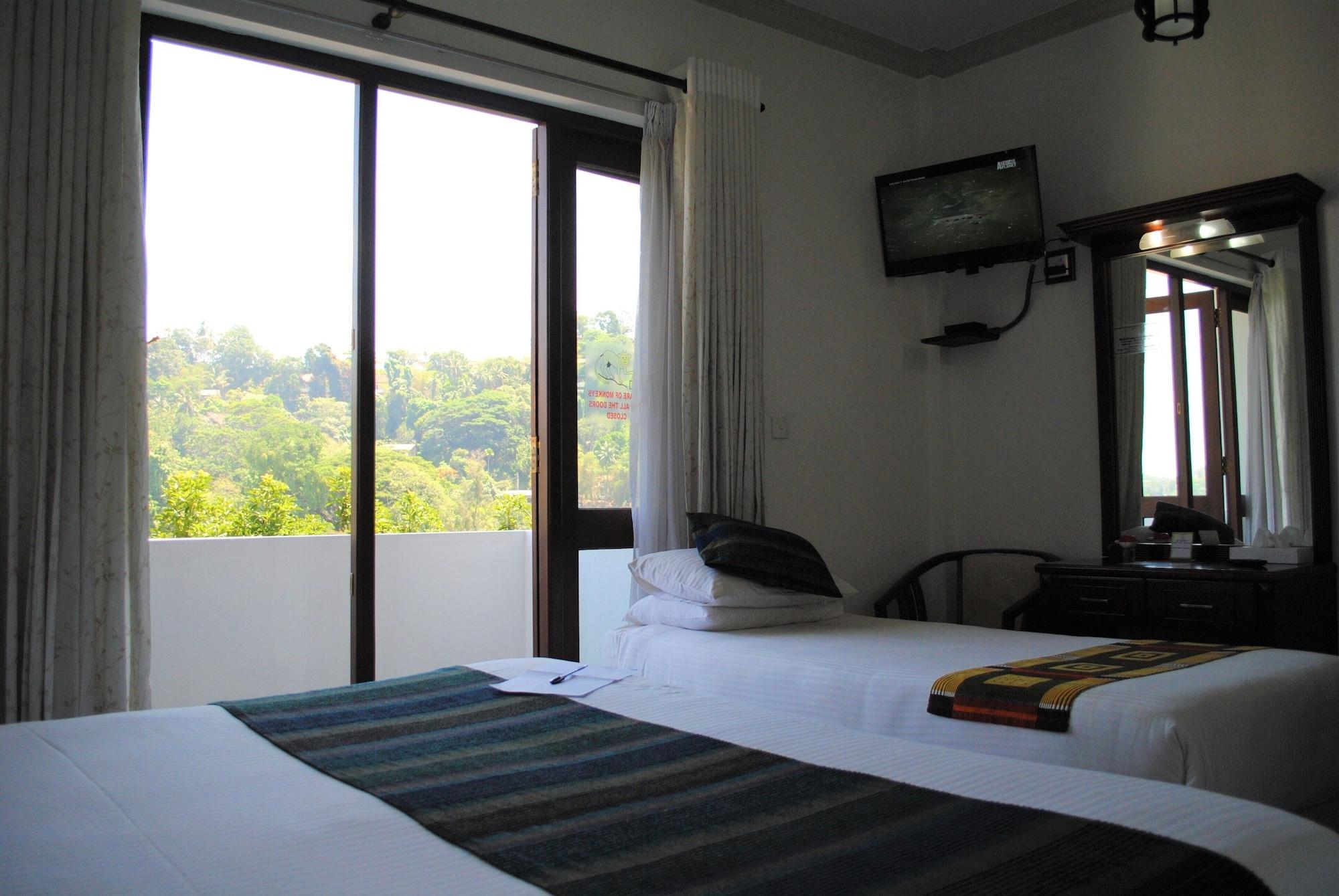 Deluxe Triple Room with Balcony