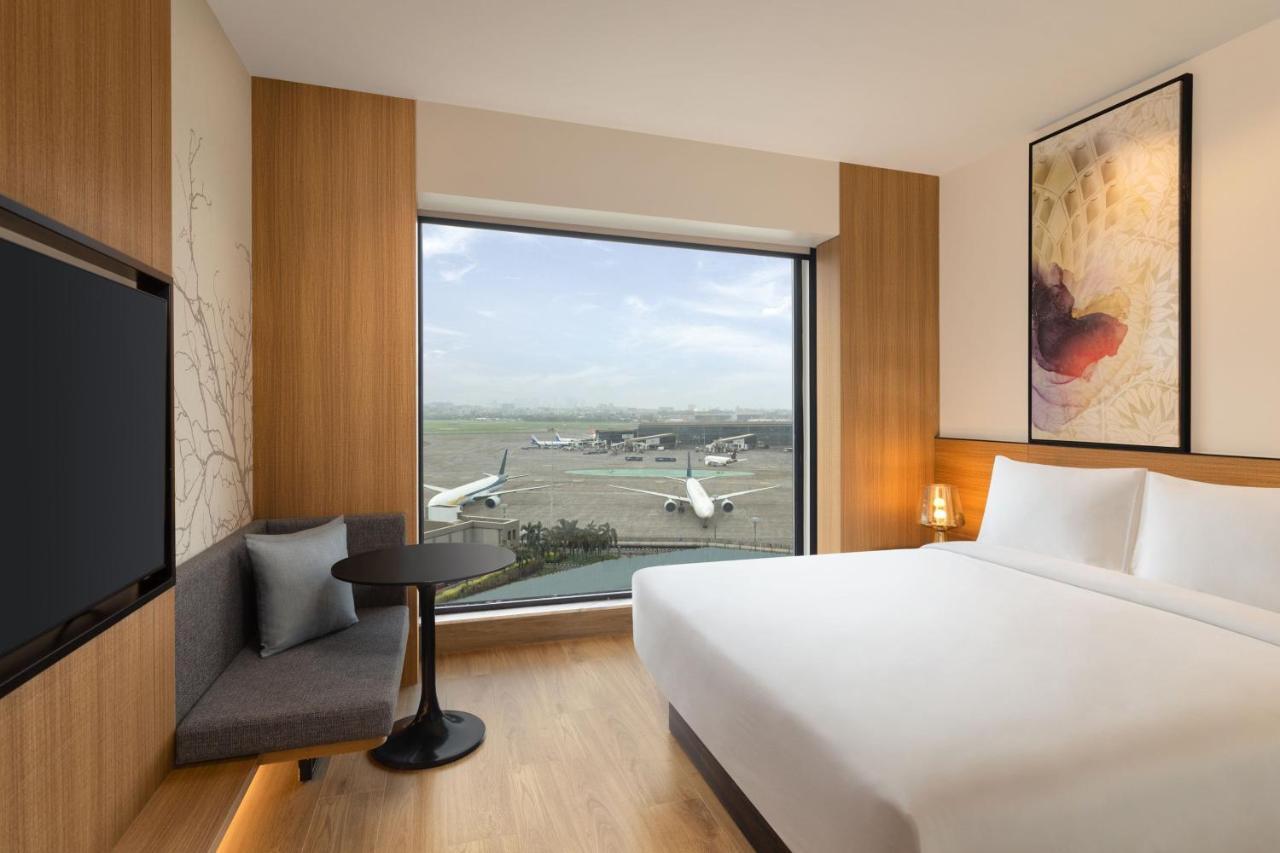 Deluxe Queen Room with Garden View with 50% discount on Buffet , 10% off on Airport Transfers , Laundry and Happy Hours on beverages enjoy 1+1 offer on select beverages