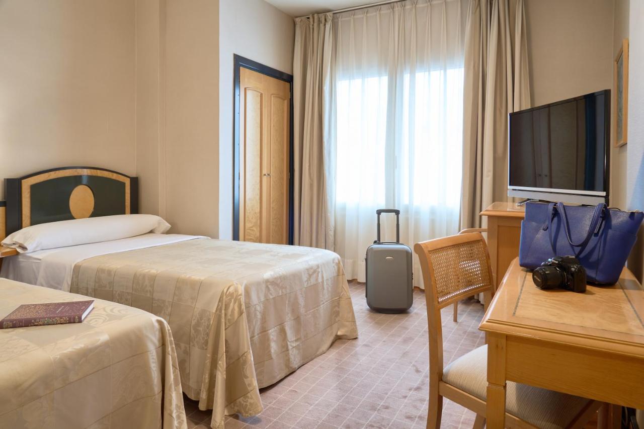 Double or Twin Room with Extra Bed (2 Adults + 1 Child)