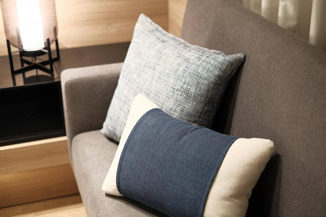 Superior Triple Room with Two Twin Beds and Sofa Bed