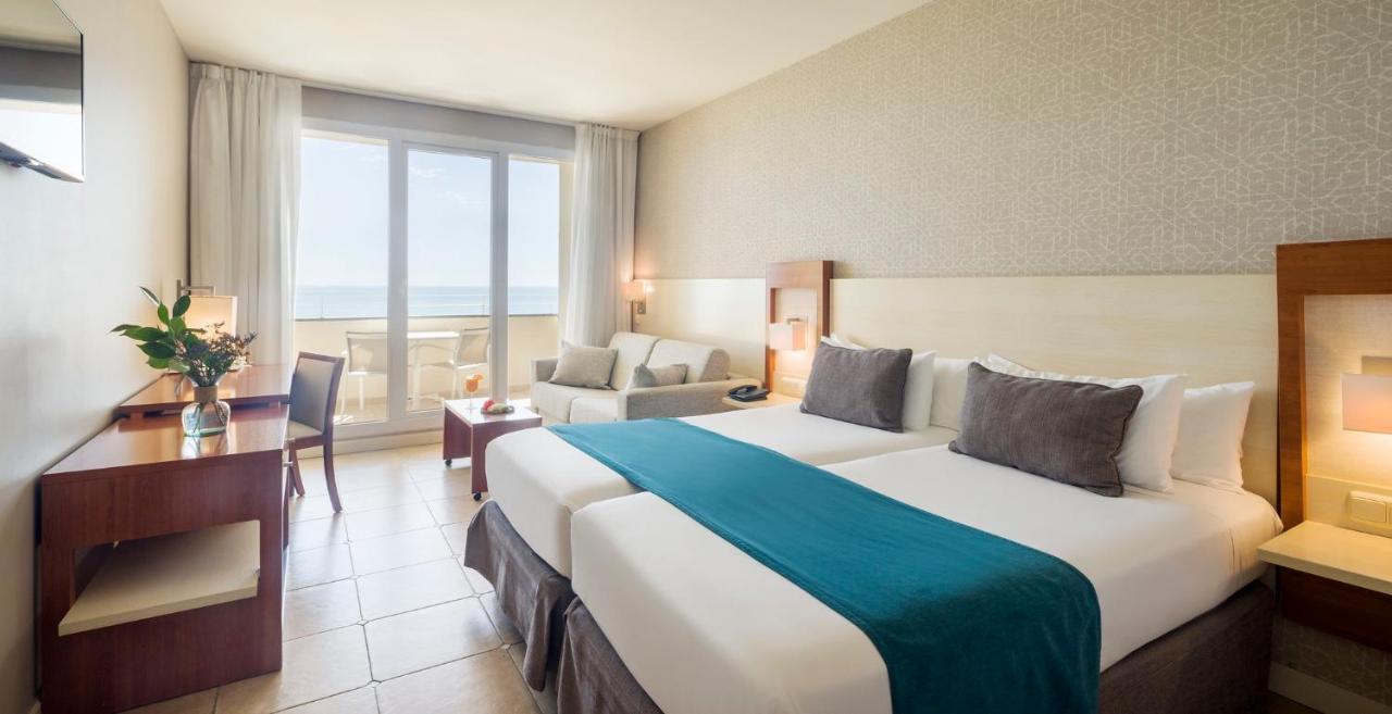 Triple Room with Sea View (2 Adults + 2 Children)