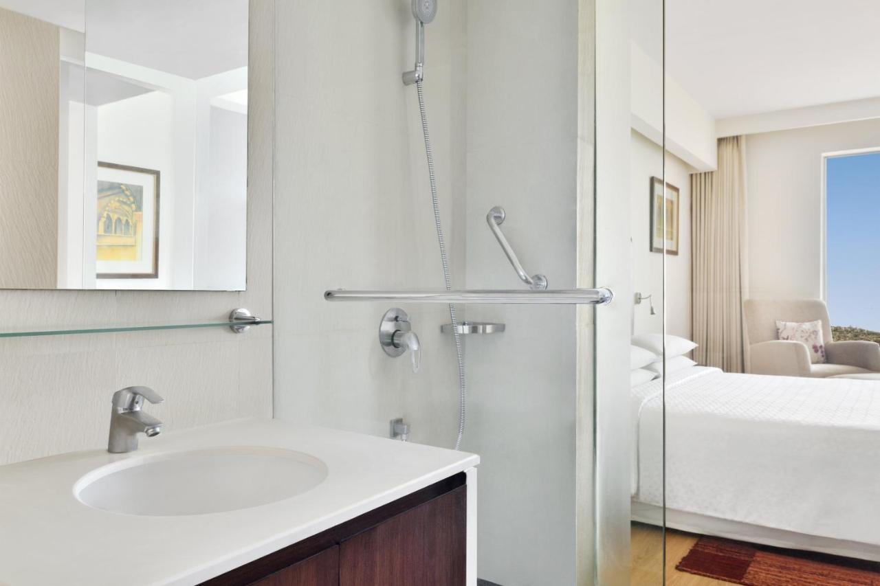 Club King Room with Lounge Access ( 20% Dis on SPA, Laundry and Food & Soft Beverages only at The Eatery, One way Airport/Railway Transfer complimentary,Credit Meal of INR 1000/- in a the stay on Minimum bill amount of INR 2500/-)