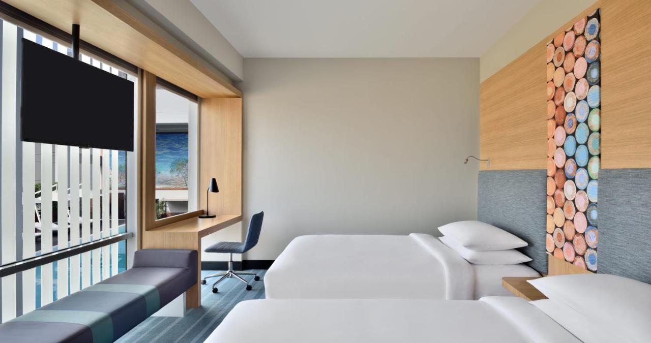 2 Twin/Single Beds, Pool View, Aloft Room:  20% discount on F&B and SPA