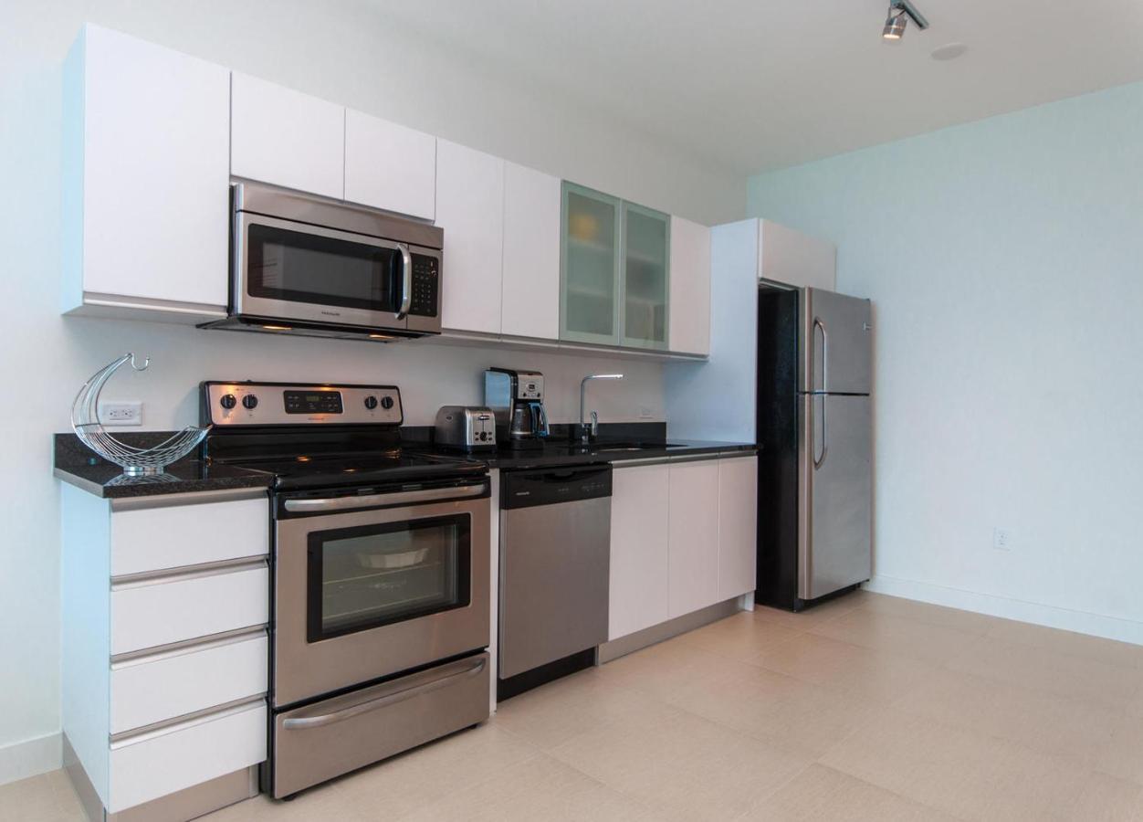 Deluxe One-Bedroom King Suite with Partial Ocean View