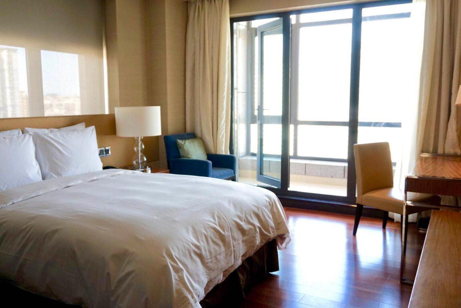 Two-Bedroom Apartment + 200㎡ + private bedroom + private living room + open-plan kitchen + laundry room + complimentary high-speed internet
