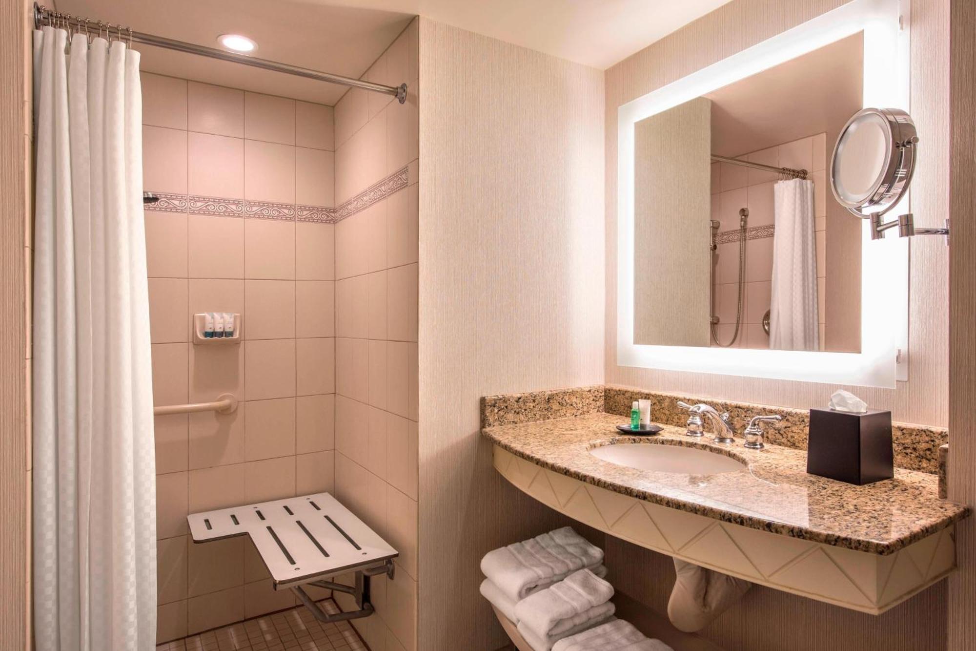King Room with Pool View and Roll-in Shower - Mobility Accessible