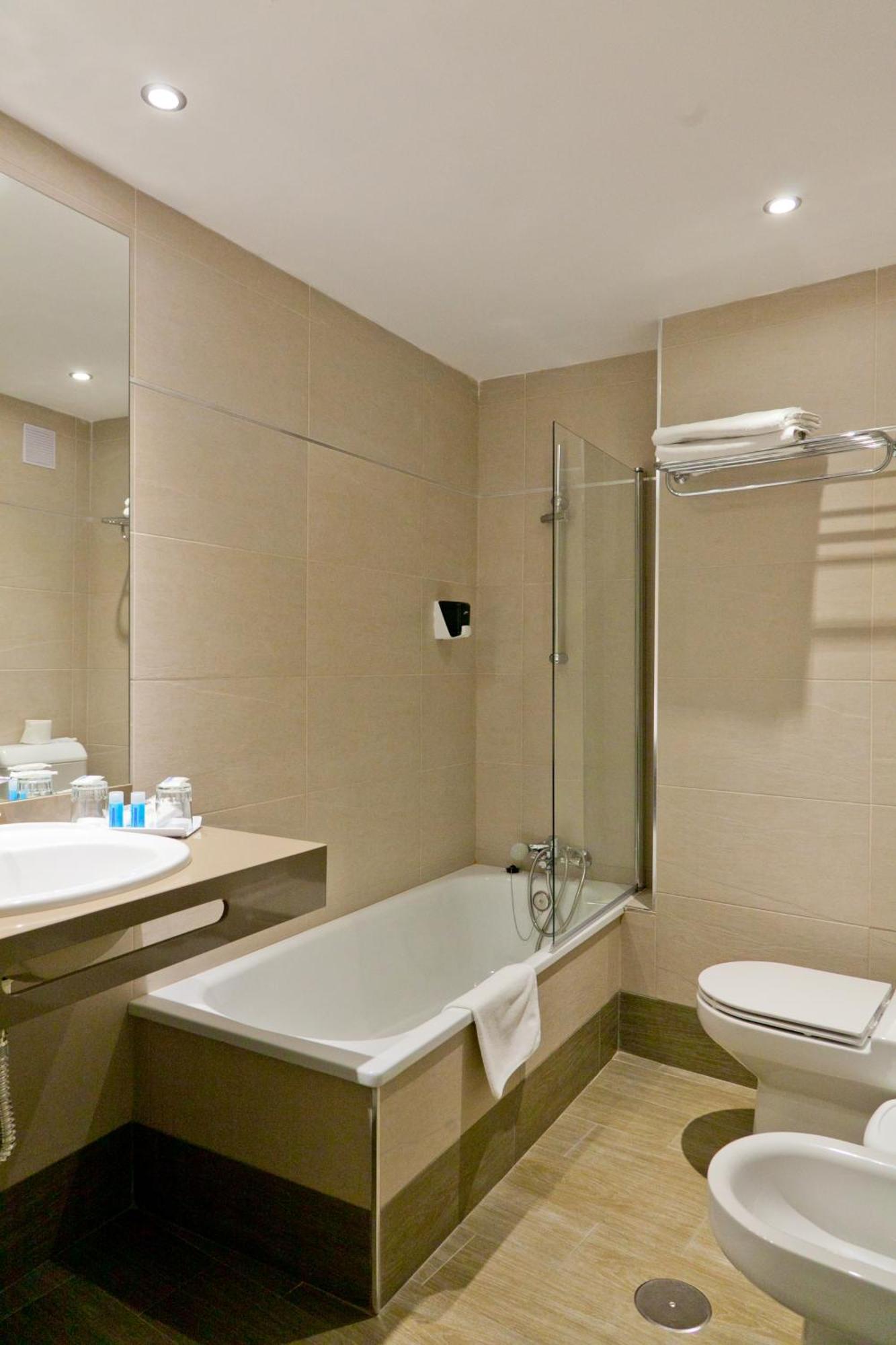 Triple Room (2 Adults + 1 Child)