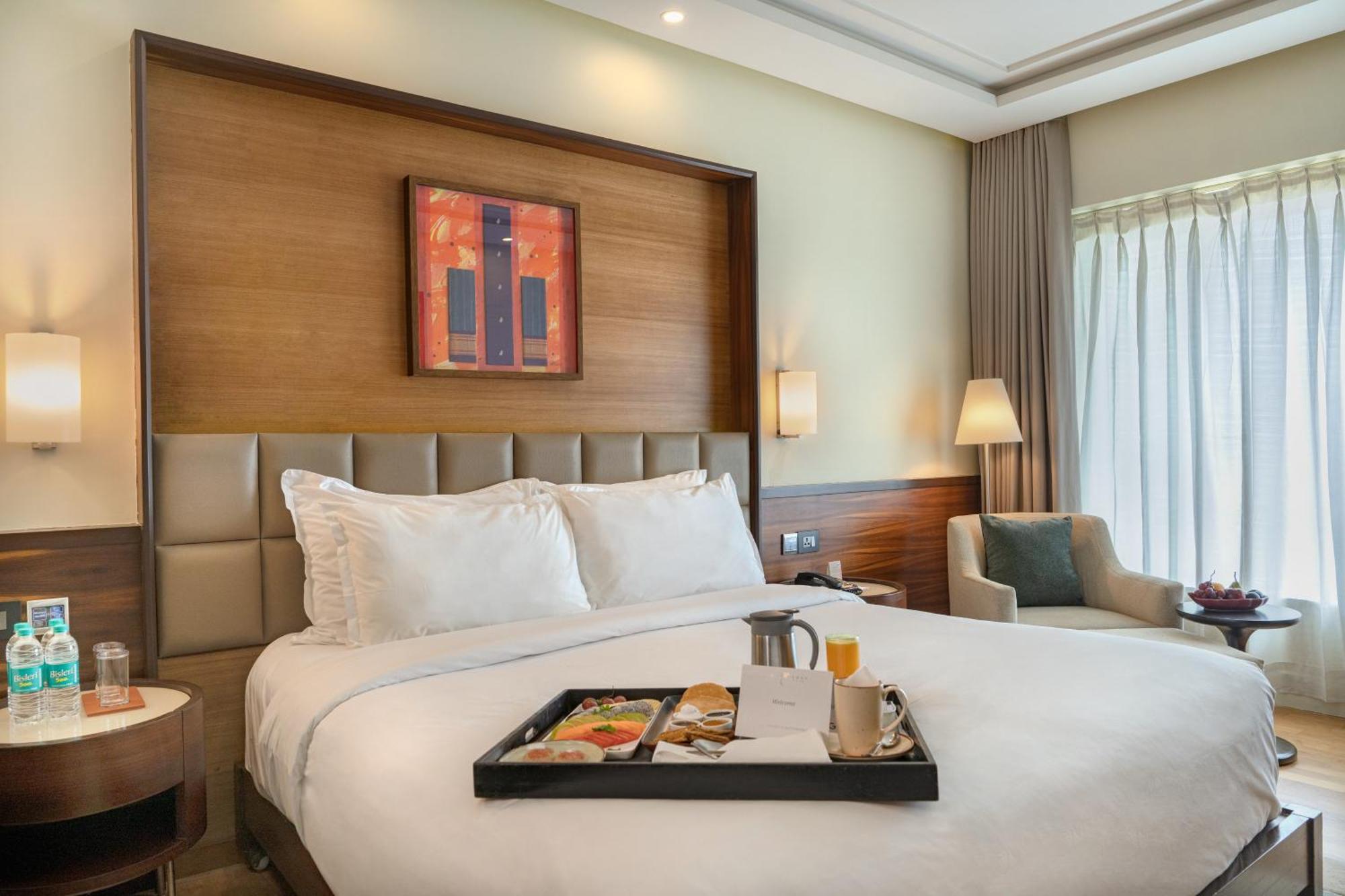 Club Myra Room with 20% discount on Buffet Lunch and Dinner, 10% discount on Laundry & Airport Pick-up