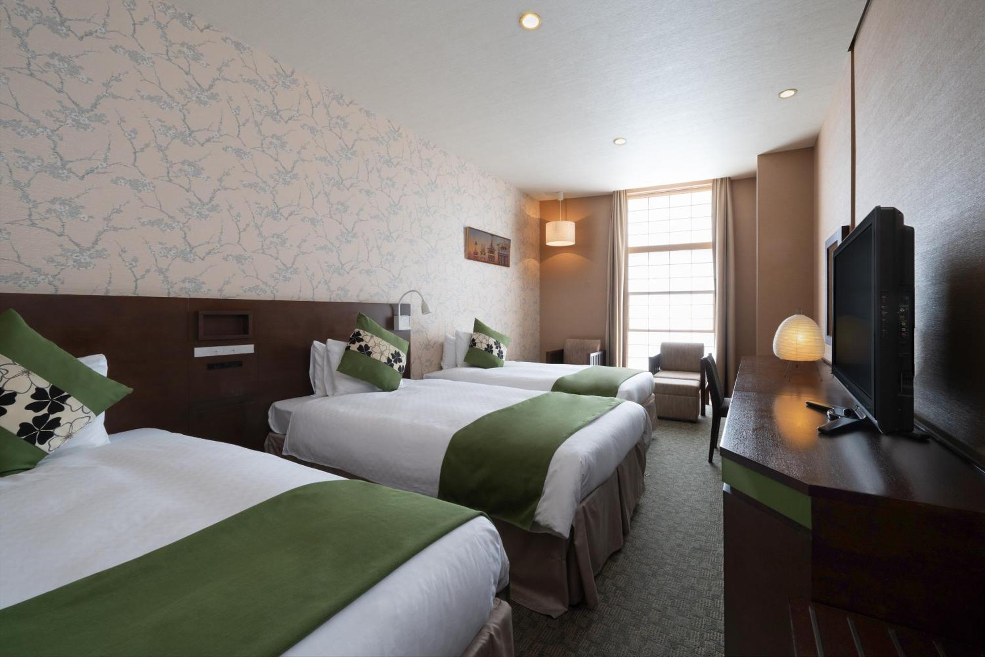 Deluxe Triple Room