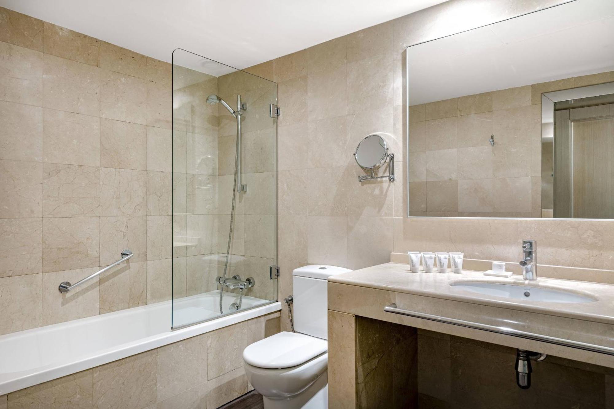 Two-Bedroom Suite with One King and Two Twin Beds