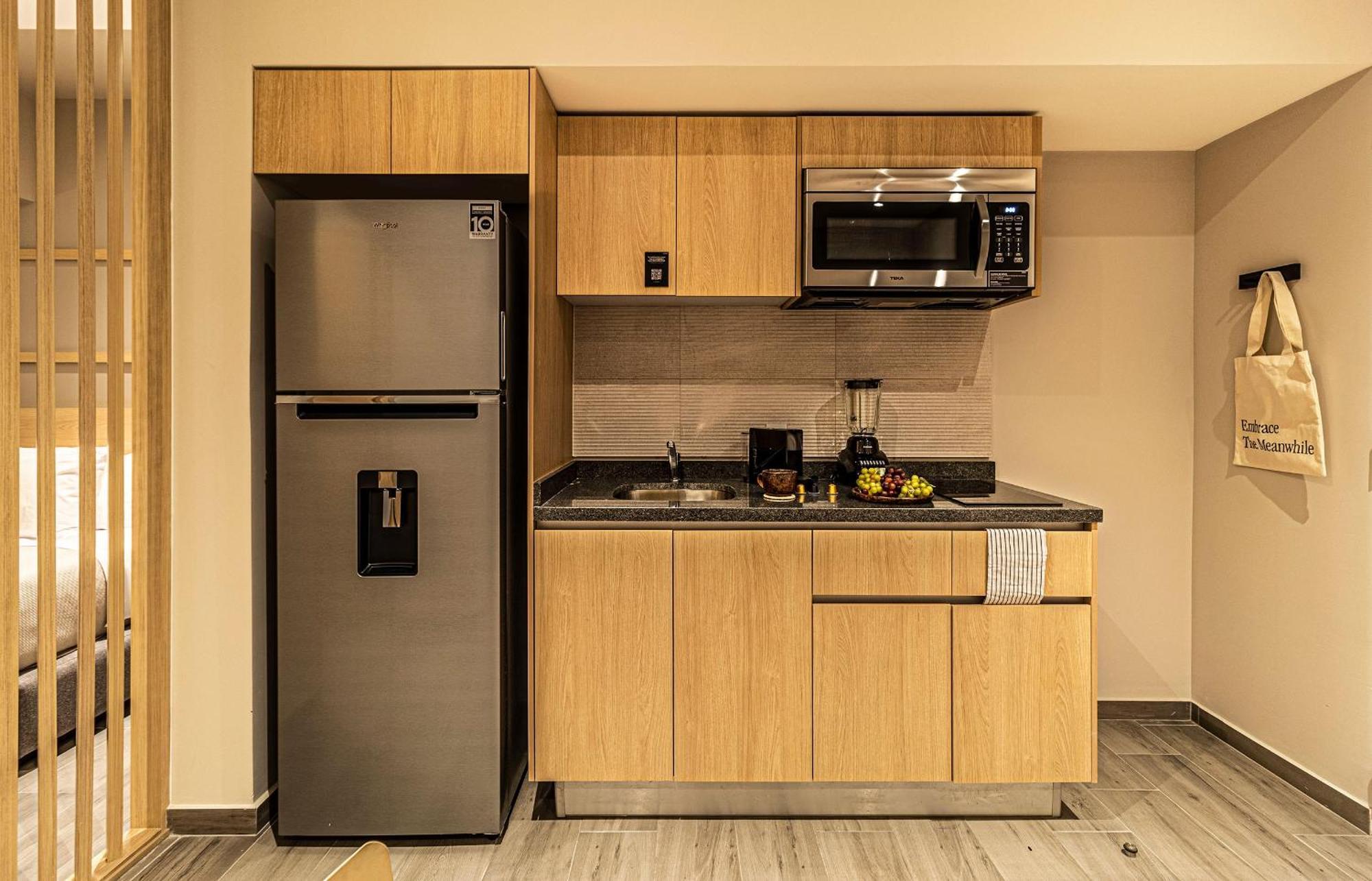 One-Bedroom Apartment with Balcony and City View