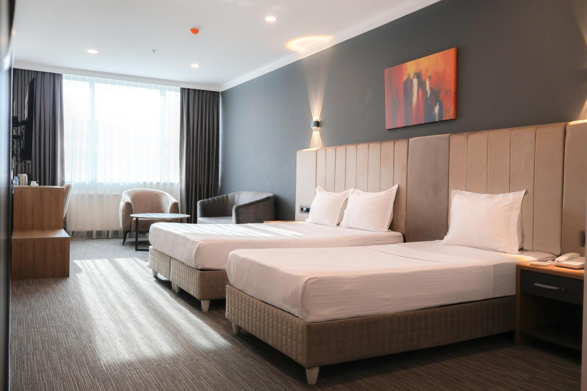 Deluxe Triple Room