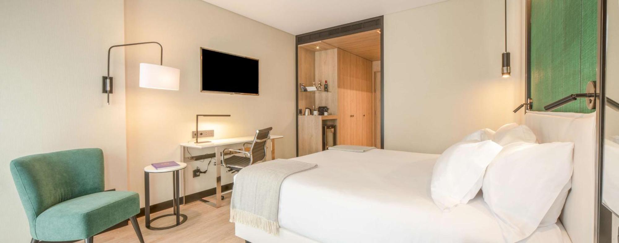 Family Adjoining Room (3 Adults + 1 Child)