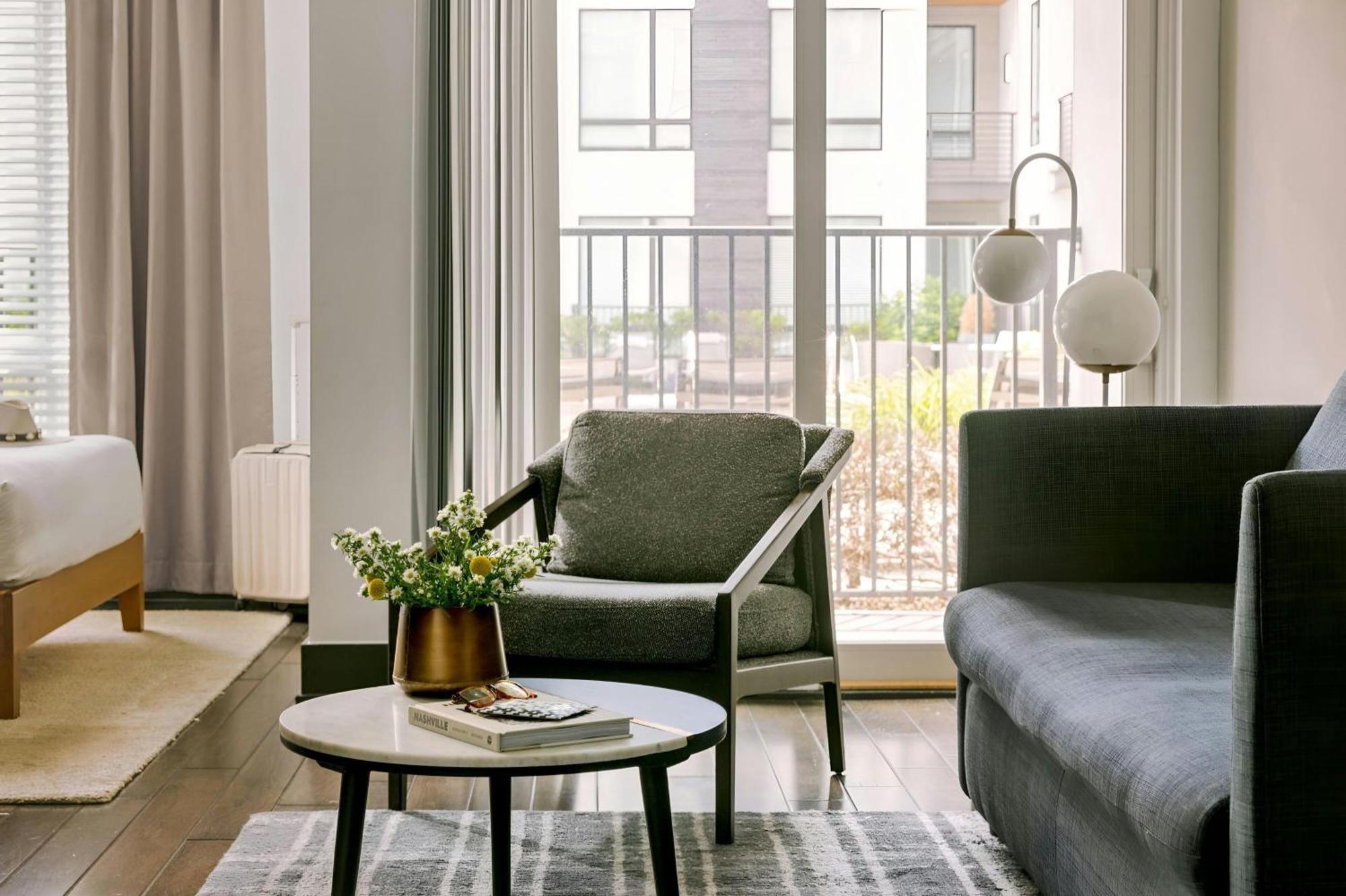 Studio Apartment with Queen Bed and Balcony - Mobility Accessible with Roll-in Shower