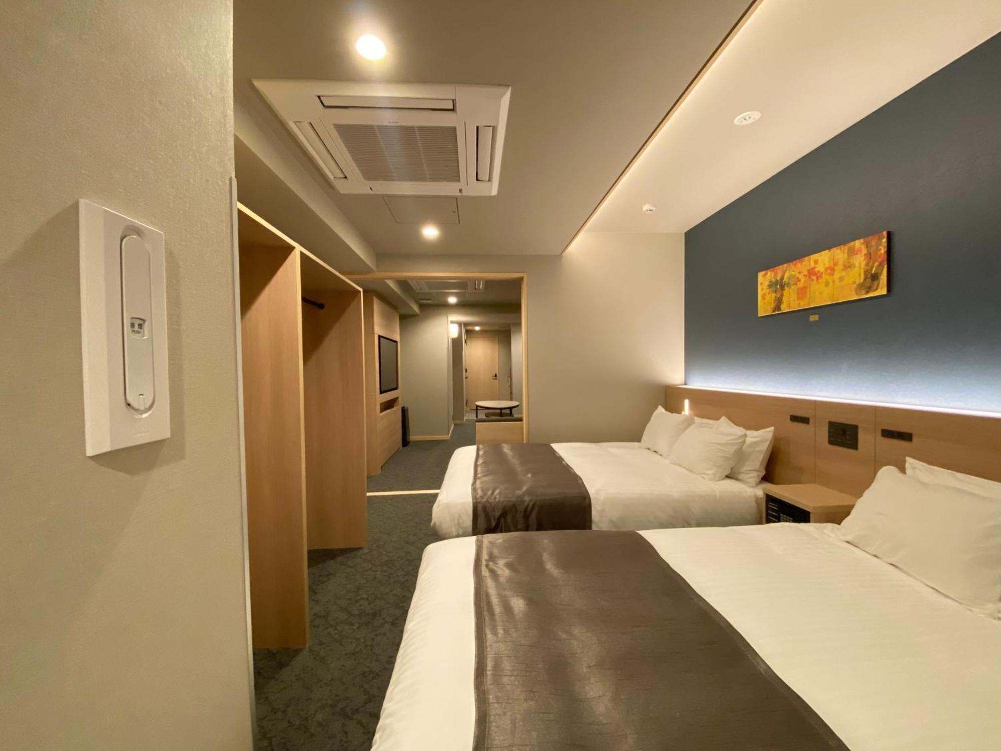 Suite Room with City view and Washing Machine