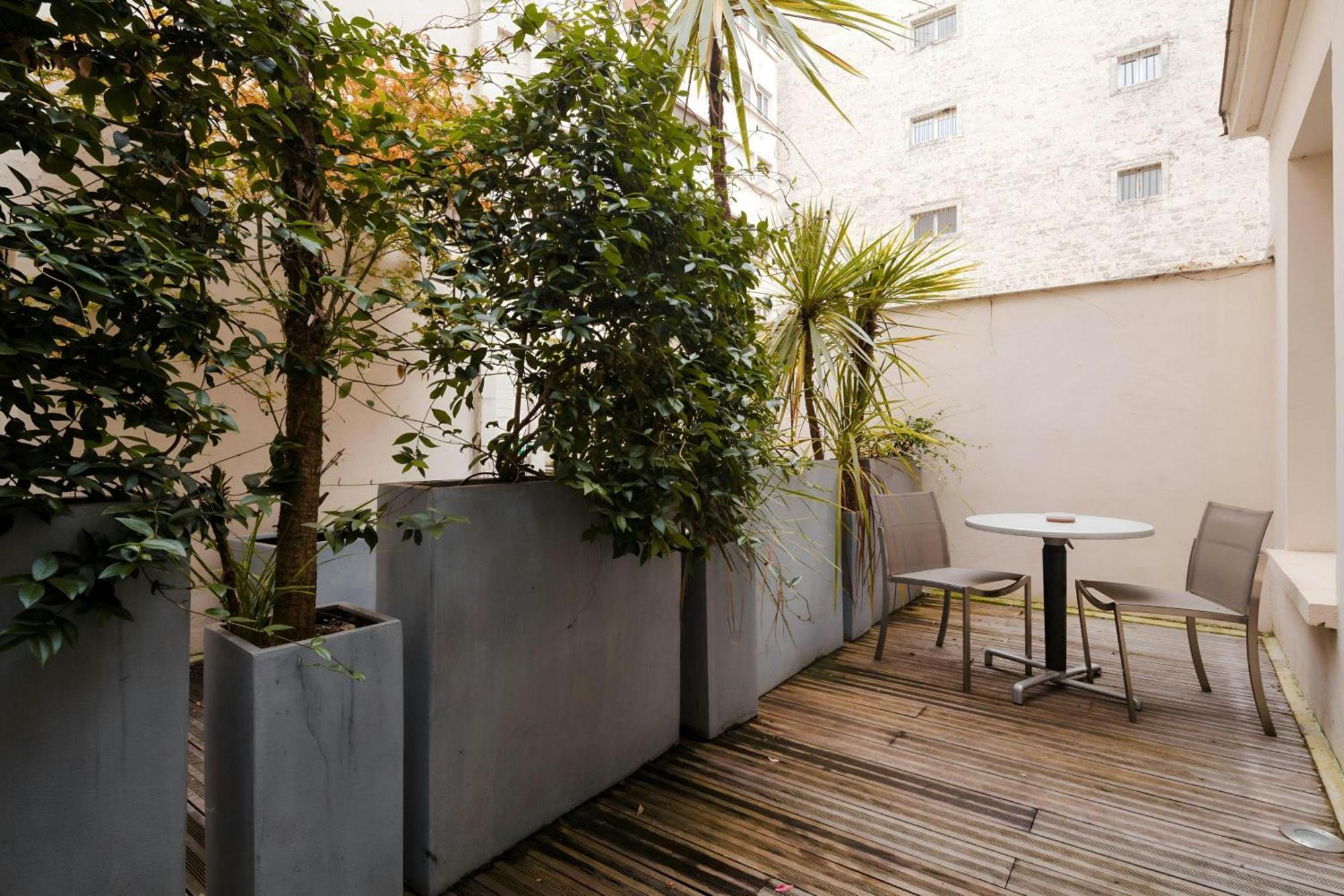 Suite avec kitchenette et coin extérieur