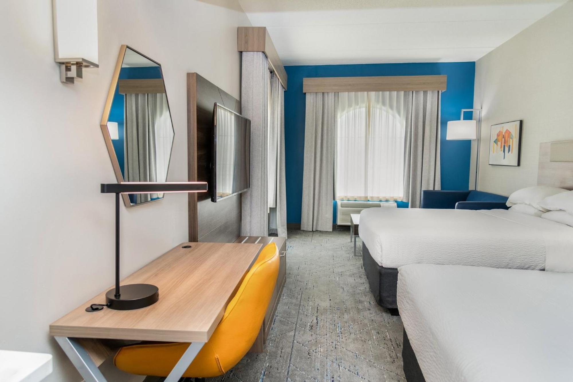 Queen Suite with Two Queen Beds and Sofa Bed