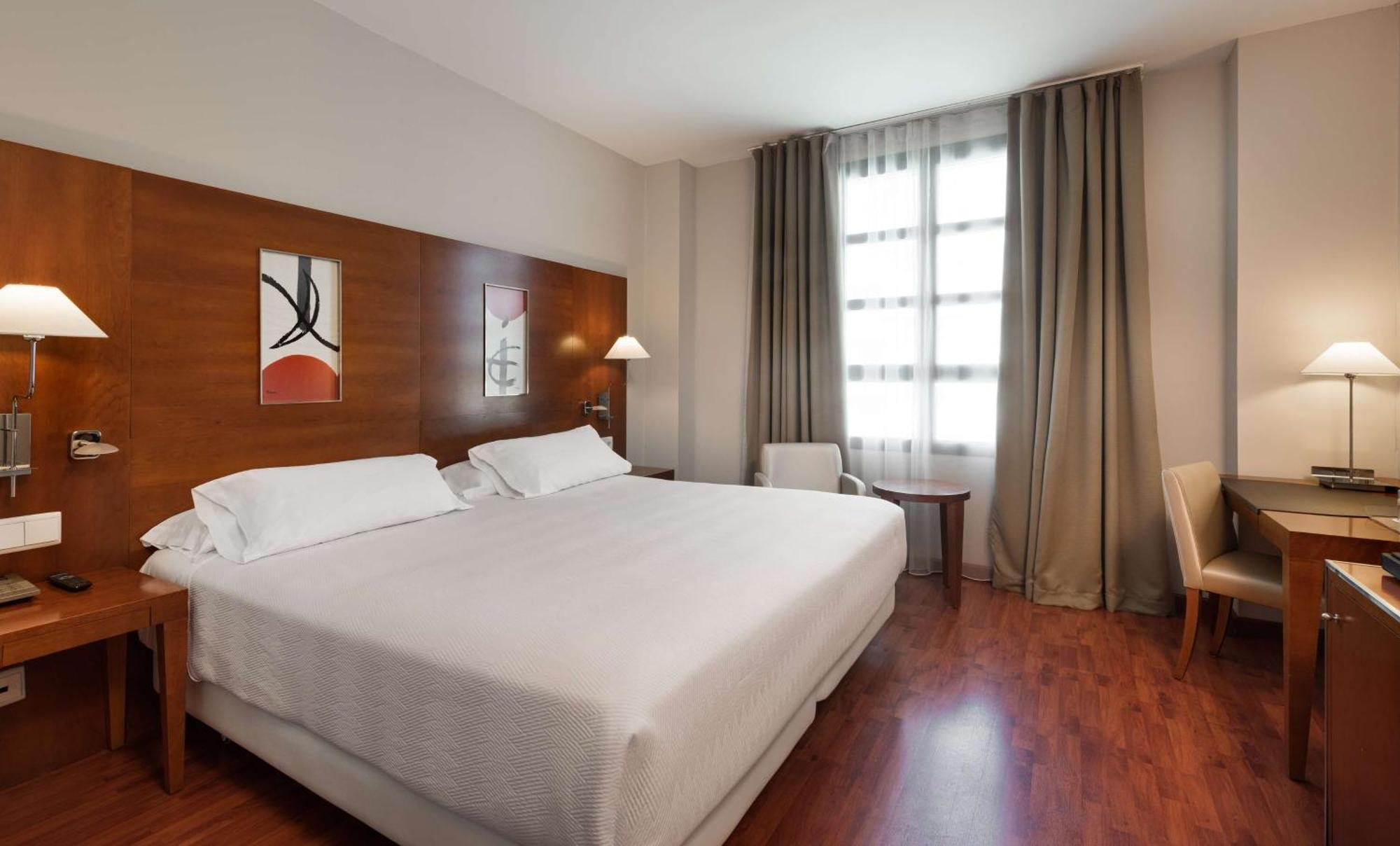 Family Adjoining Room (3 Adults + 1 Child)