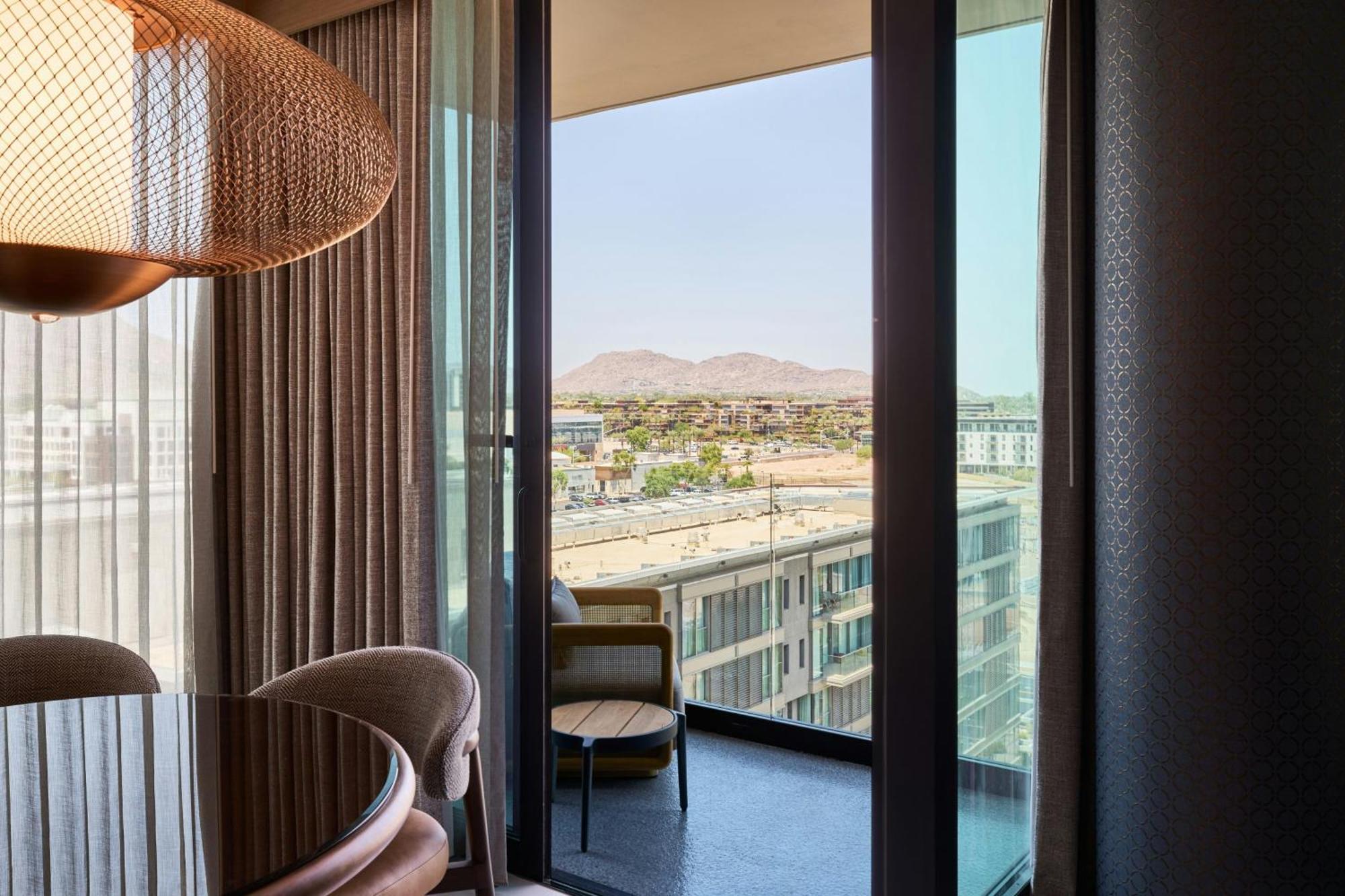 Corner King Suite with Balcony and City View