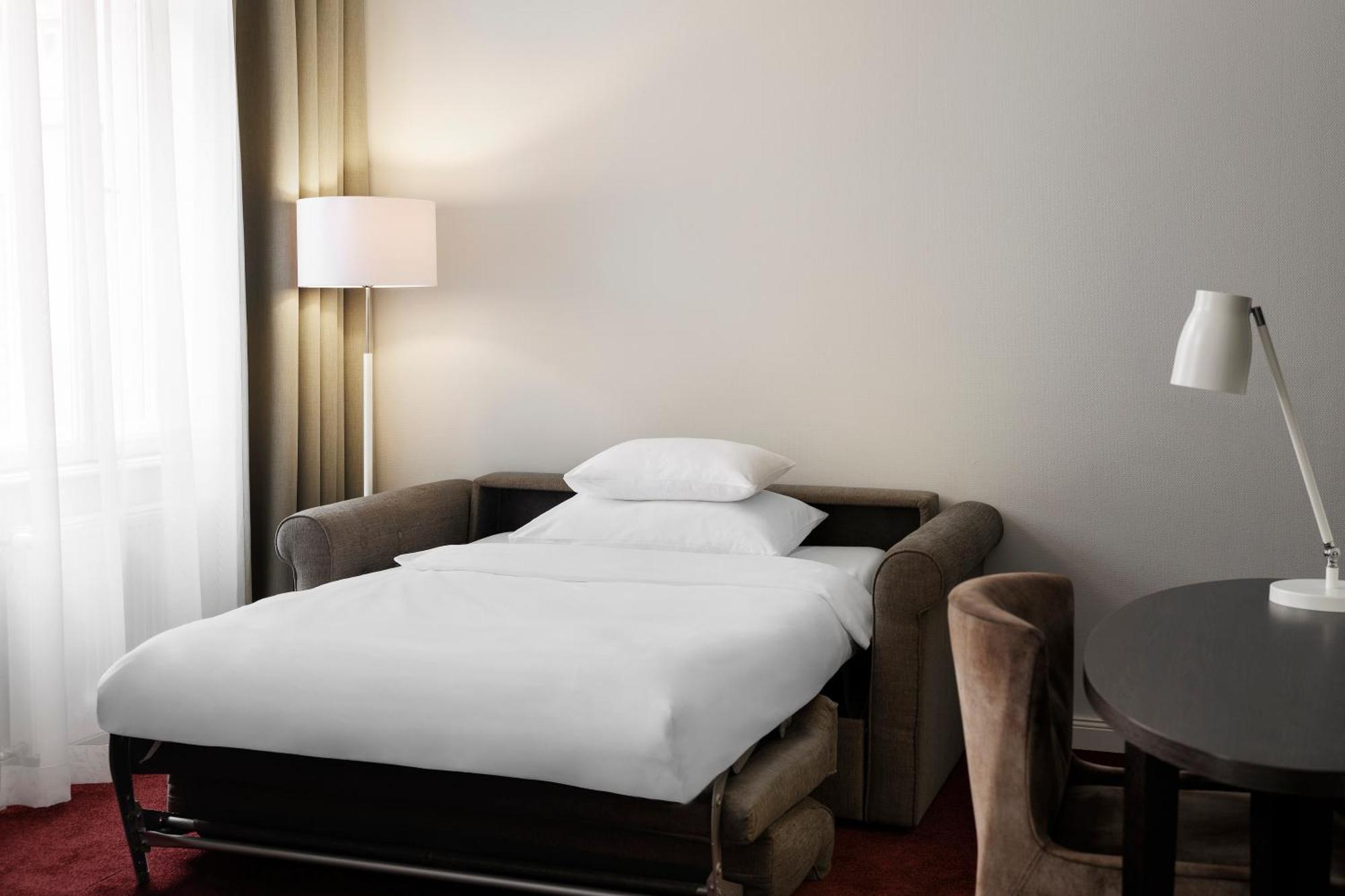 Deluxe Room with King Bed and Sofa Bed
