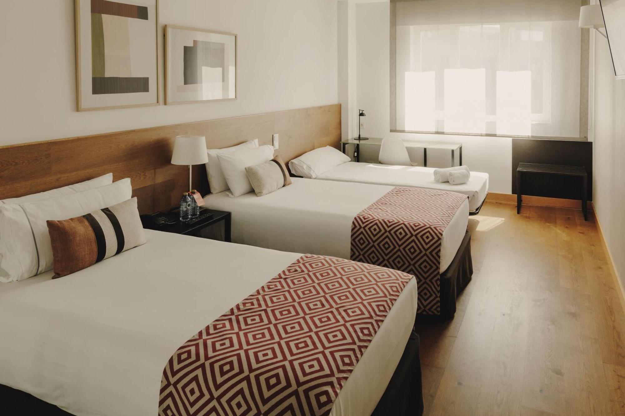 Double or Twin Room with Extra Bed (2 Adults + 1 Child)