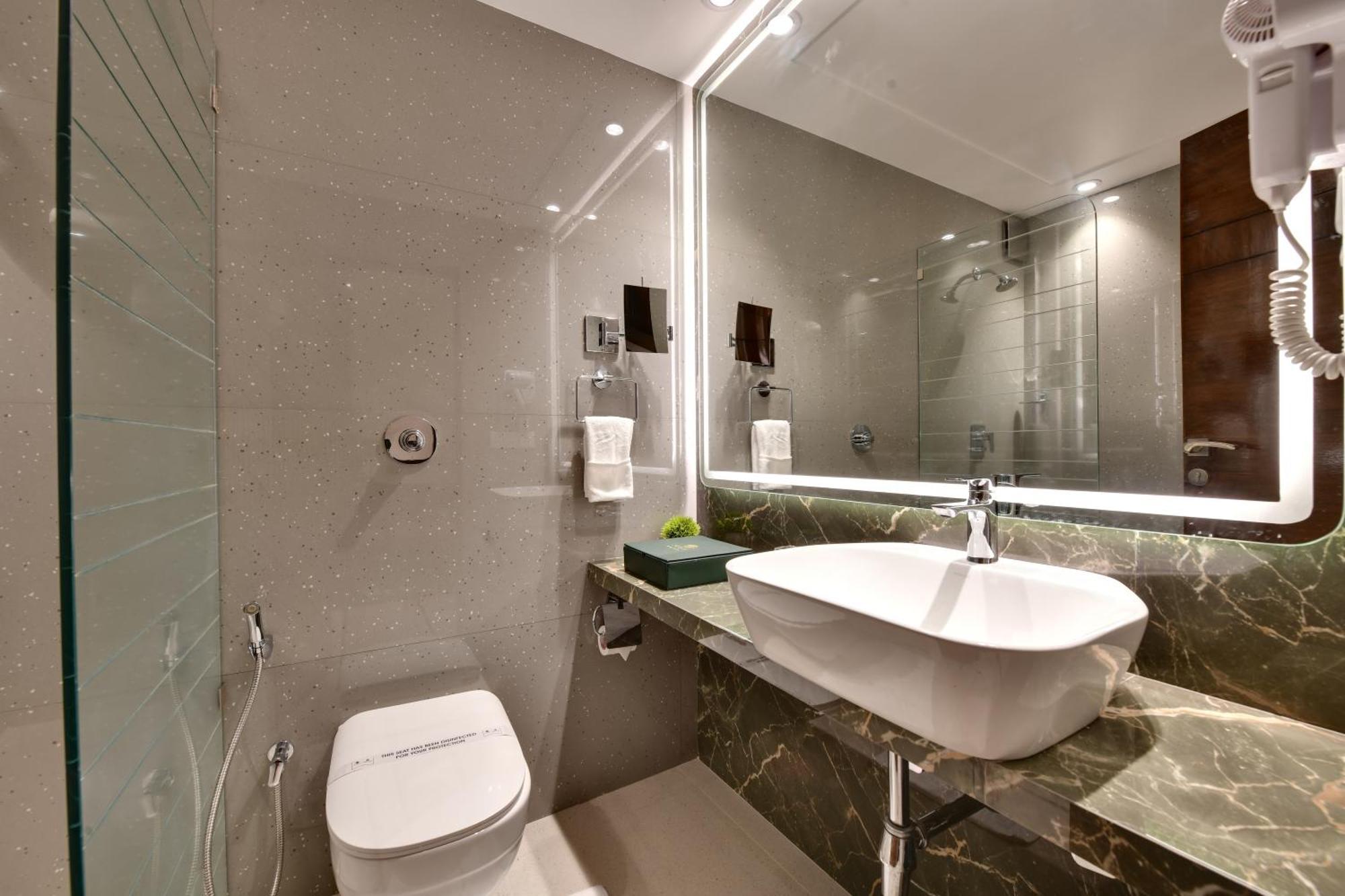 Deluxe Double or Twin Room with 10% off on Food and Soft Beverage , Laundry and Spa per stay.