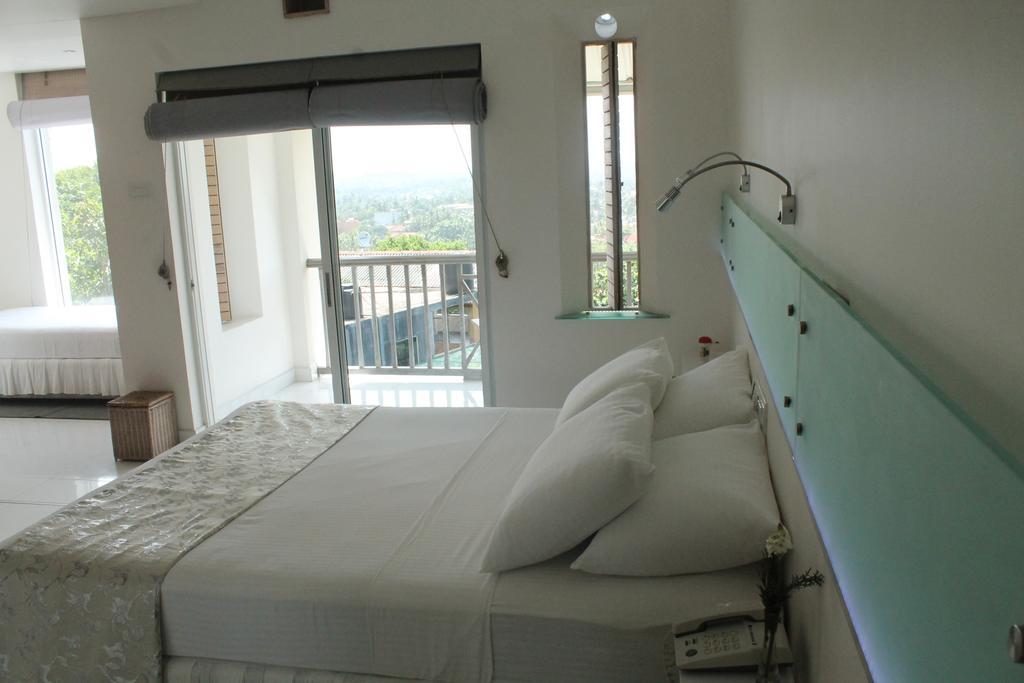 Deluxe Triple Room with Balcony